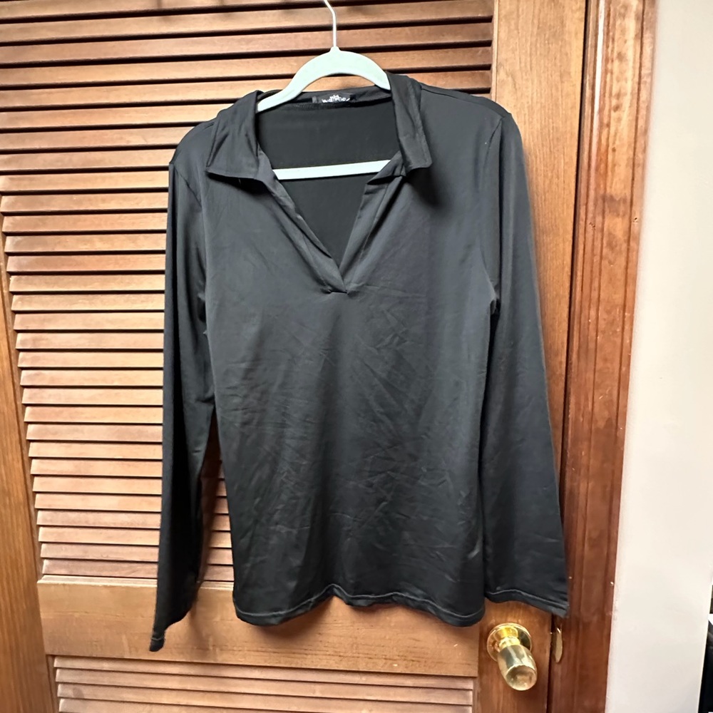 Black long sleeve top.